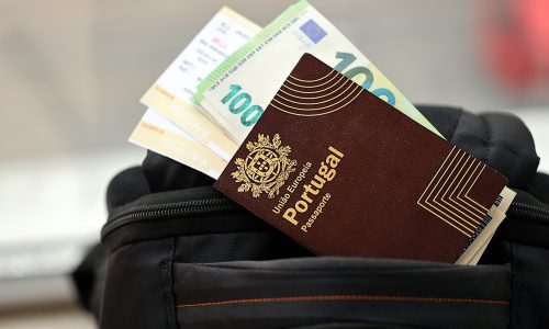 Red,Portugal,Passport,Of,European,Union,With,Money,And,Airline