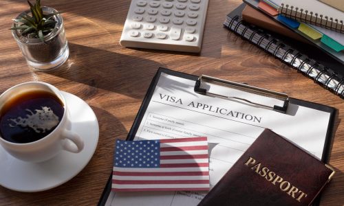 visa-application-composition-with-american-flag-1-scaled.jpg